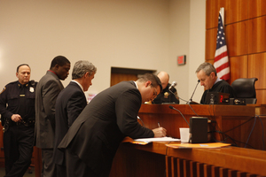 Marquis Spruill, far left, was one of two Syracuse football players, along with Steve Rene, to appear in court Wednesday as a hearing for an incident occurring Dec. 2.