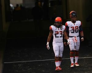 Syracuse seniors Prince-Tyson Gulley (23) and Cameron Lynch (38) will play in their final SU game on Saturday at Boston College.