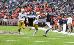 Eric Dungey threw for 363 yards in Saturday's loss to Notre Dame. He also ran for three touchdowns.