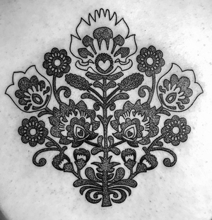 Kelly Veshia's tattoo of Polish folk art flowers is in honor of her Polish heritage. 