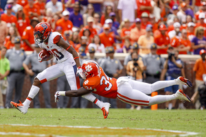 Taj Harris caught three passes for 66 yards on Saturday against Clemson. 