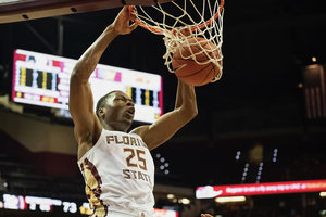 Mfiondu Kabengele dunks the ball.