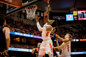 Oshae Brissett is met by multiple defenders at the rim. He had just six points on 2-8 shooting in a losing effort on Monday.