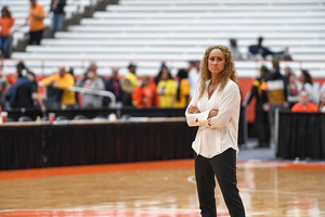 Syracuse assistant coach Tammi Reiss stands on the sidelines. Reiss is in her third year as a guard coach for SU.