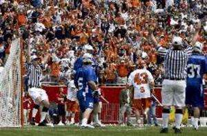 Cody Jamieson runs from the goal after Syracuse scores and Orange fans rejoice Saturday at Gillette Stadium during Sracuse's 17-7 win over Duke.