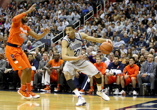 Otto Porter drives to the basket against James Southerland.