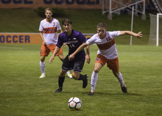 Ricks fights for position on a loose ball. 