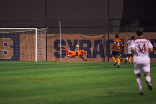 SU goalkeeper Hendrik Hilpert dives for a ball.