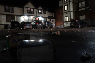 More than 100 people, many without masks, gathered at Castle Court on Sunday night following victories from Syracuse University’s men’s and women’s basketball teams in the NCAA Tournament. The group shouted in celebration as cars passing by honked their horns before the Syracuse Police Department arrived to break up the party, and the group left the remains of crushed beer cans and boxes once the students dispersed down Comstock and Euclid avenues.