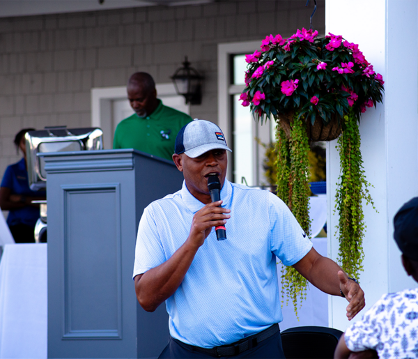 Adrian Autry attends 100 Black Men of Syracuse Golf Tournament fundraiser